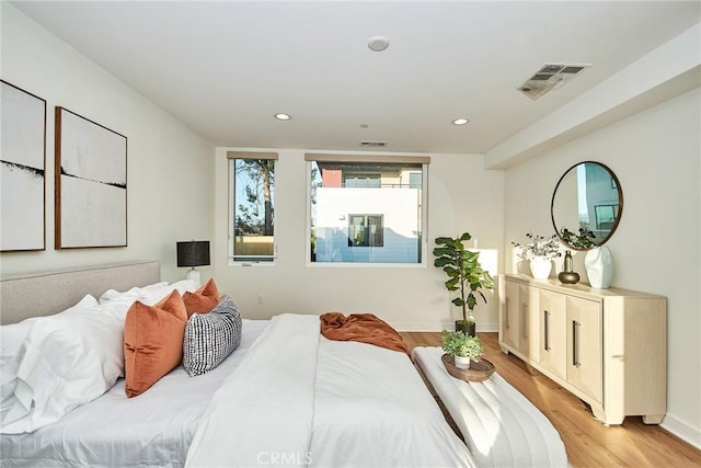 1050 N Joels Pl, Los Angeles, CA 90012 - bedroom with light wood-style flooring and recessed lighting