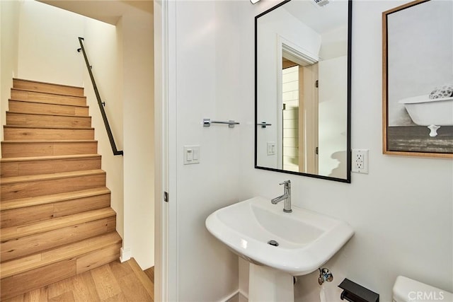 1050 N Joels Pl, Los Angeles, CA 90012 - bathroom with a sink and wood finished floors