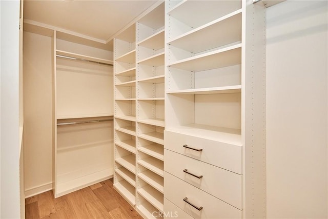 1050 N Joels Pl, Los Angeles, CA 90012 - spacious closet featuring wood finished floors