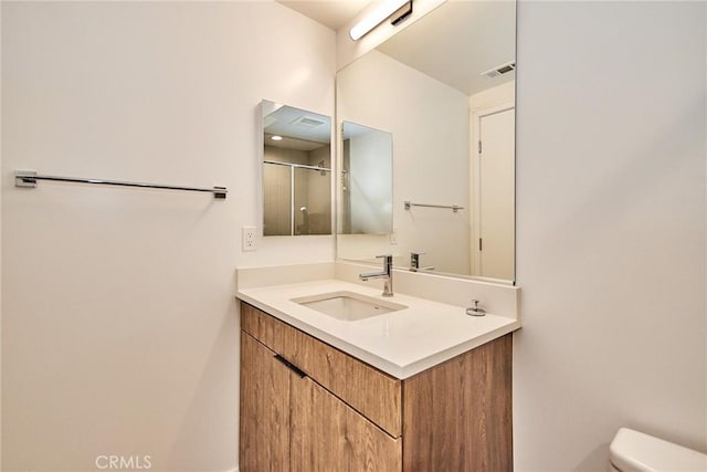 1050 N Joels Pl, Los Angeles, CA 90012 - bathroom featuring vanity and a shower with shower door