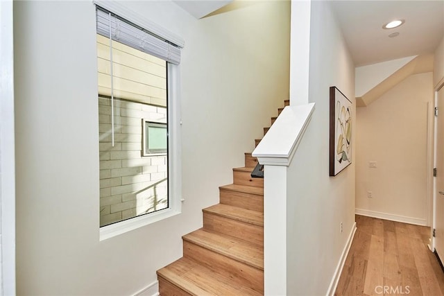 1050 N Joels Pl, Los Angeles, CA 90012 - stairway featuring wood finished floors and recessed lighting