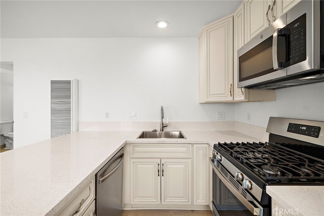 33771 Copper Lantern St, Dana Point, CA 92629 - kitchen featuring appliances with stainless steel finishes, recessed lighting, and a peninsula