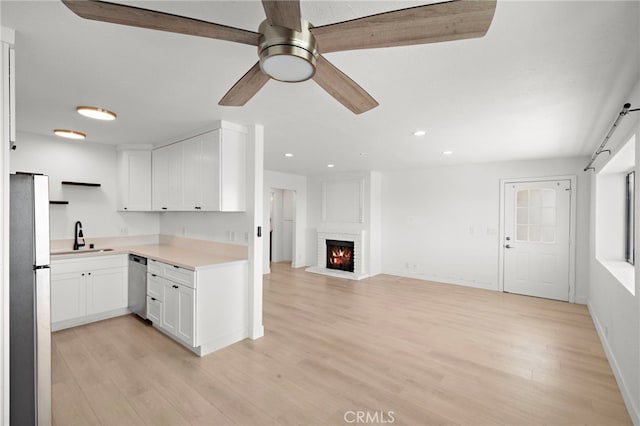 33771 Copper Lantern St, Dana Point, CA 92629 - kitchen with dishwasher, freestanding refrigerator, ceiling fan, open floor plan, and open shelves