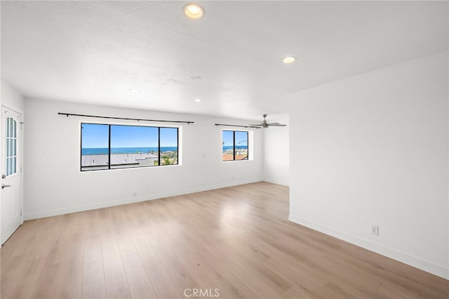 33771 Copper Lantern St, Dana Point, CA 92629 - empty room featuring light wood finished floors, recessed lighting, and ceiling fan