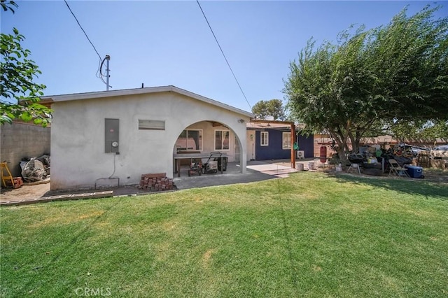 43926 3rd St E, Lancaster, CA 93535 - rear view of house with a patio area and stucco siding
