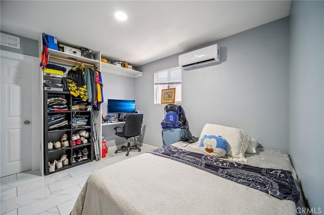 43926 3rd St E, Lancaster, CA 93535 - bedroom with a wall mounted AC, marble look tiles, and an office area