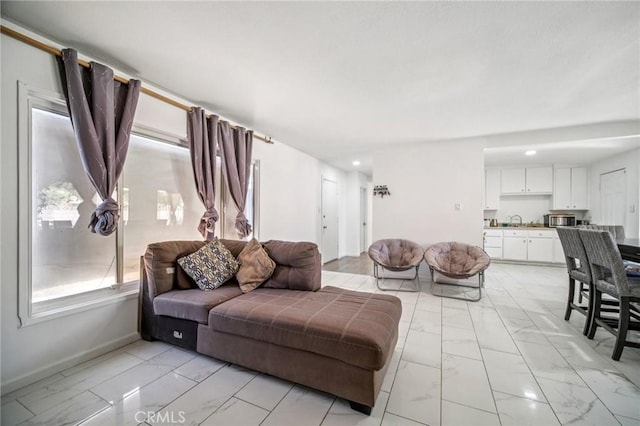 43926 3rd St E, Lancaster, CA 93535 - living area with light marble finish floors and recessed lighting