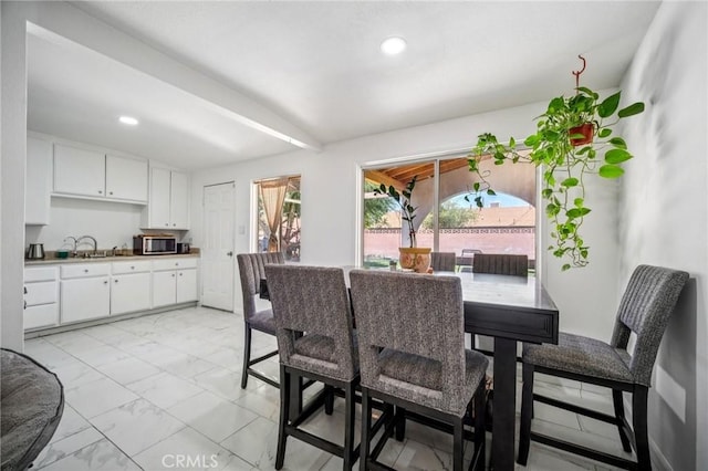 43926 3rd St E, Lancaster, CA 93535 - dining space featuring light marble finish flooring and recessed lighting