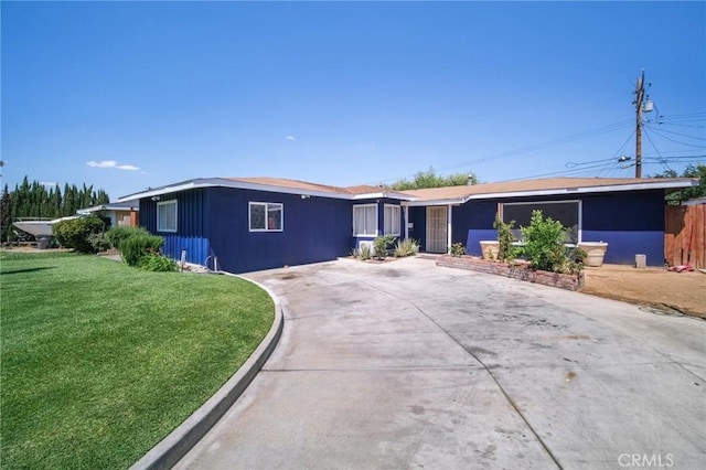 43926 3rd St E, Lancaster, CA 93535 - ranch-style house with a front yard and concrete driveway
