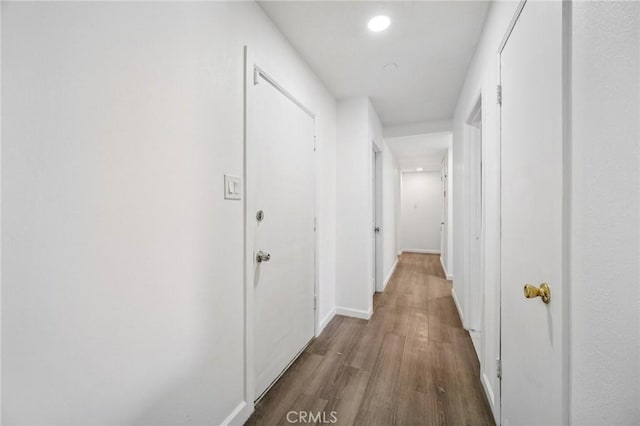 43926 3rd St E, Lancaster, CA 93535 - hallway with dark wood-style floors and recessed lighting