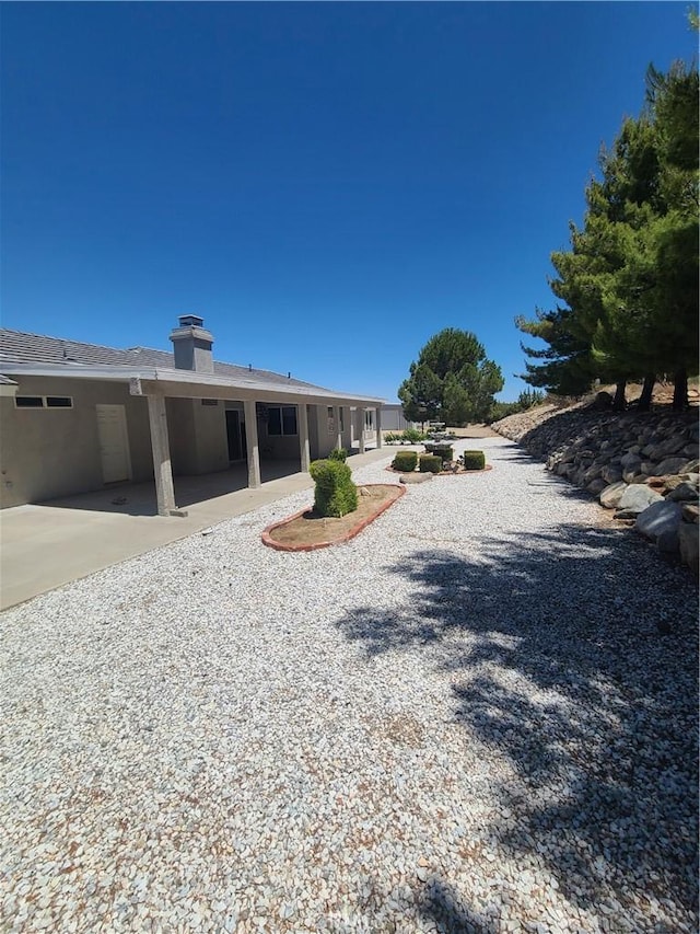 325 Canyon Rd, Pinon Hills, CA 92372 - back of house featuring a patio