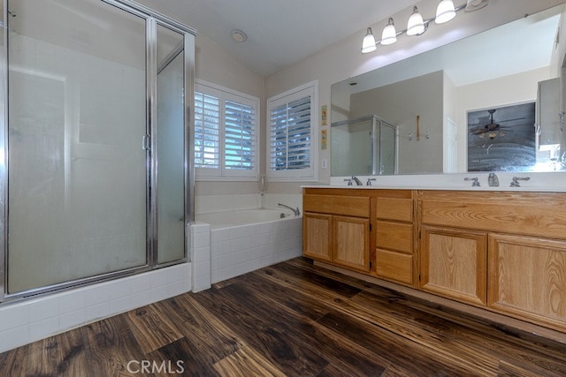 20770 Stony Brook Cir, Riverside, CA 92508 - bathroom featuring a shower stall, wood finished floors, a garden tub, and double vanity