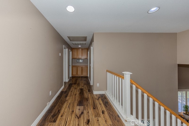 20770 Stony Brook Cir, Riverside, CA 92508 - corridor featuring dark wood-style floors, an upstairs landing, and recessed lighting