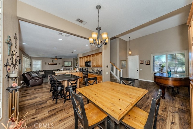 20770 Stony Brook Cir, Riverside, CA 92508 - dining space featuring wood finished floors, plenty of natural light, a chandelier, and recessed lighting