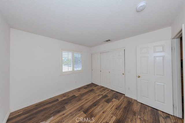 20770 Stony Brook Cir, Riverside, CA 92508 - unfurnished bedroom featuring dark wood-type flooring and a closet
