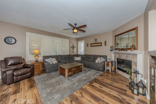 20770 Stony Brook Cir, Riverside, CA 92508 - living area with a ceiling fan, a fireplace, and wood finished floors