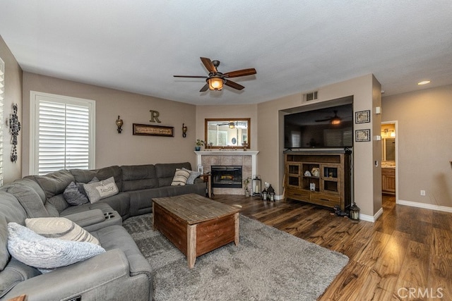 20770 Stony Brook Cir, Riverside, CA 92508 - living area featuring ceiling fan, wood finished floors, and a fireplace