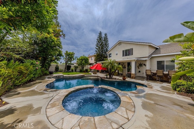 20770 Stony Brook Cir, Riverside, CA 92508 - view of swimming pool with a patio, a pool with connected hot tub, and a fenced backyard