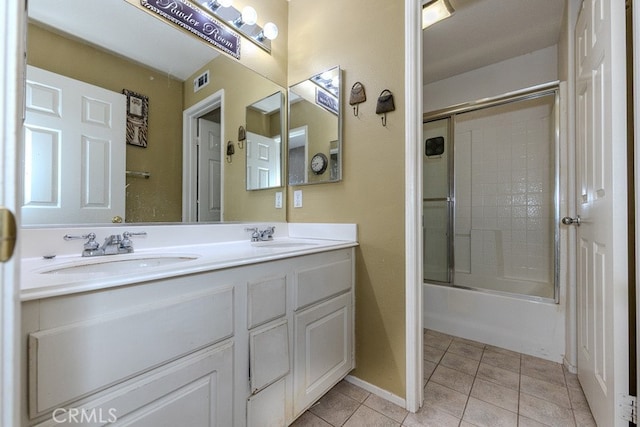 20770 Stony Brook Cir, Riverside, CA 92508 - full bathroom with tile patterned flooring, double vanity, and shower / bath combination with glass door
