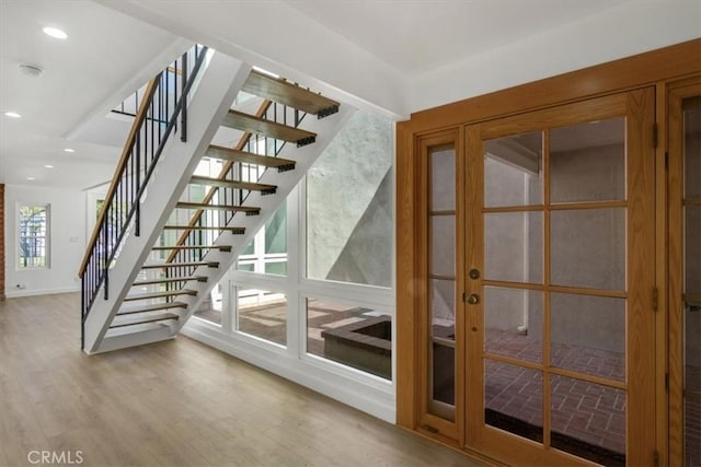 6 Mandrake Way, Irvine, CA 92612 - stairs with wood finished floors, french doors, and recessed lighting