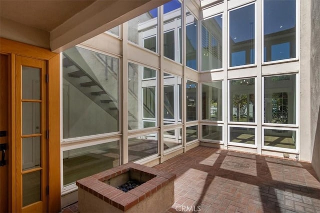 6 Mandrake Way, Irvine, CA 92612 - unfurnished sunroom with a fire pit