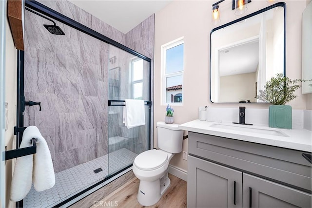 2709 Cogswell Rd Unit A, El Monte, CA 91732 - bathroom featuring vanity, a shower stall, and wood finished floors