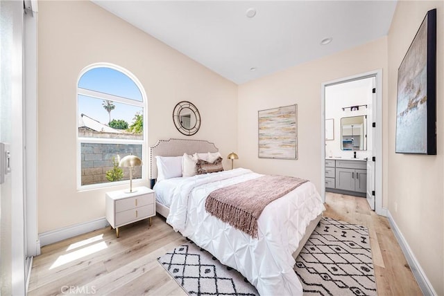 2709 Cogswell Rd Unit A, El Monte, CA 91732 - bedroom with light wood-style flooring and ensuite bath