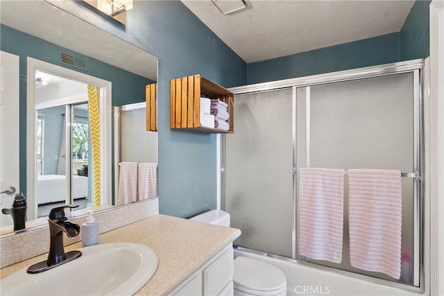 20191 Cape Coral Ln Unit 3-206, Huntington Beach, CA 92646 - bathroom with vanity and shower / bath combination with glass door