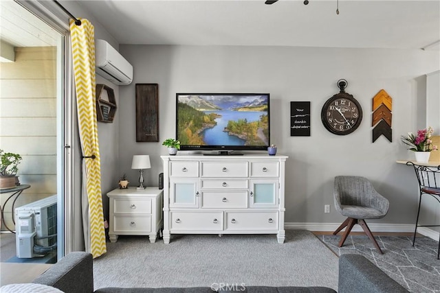 20191 Cape Coral Ln Unit 3-206, Huntington Beach, CA 92646 - sitting room featuring a wall mounted AC and carpet