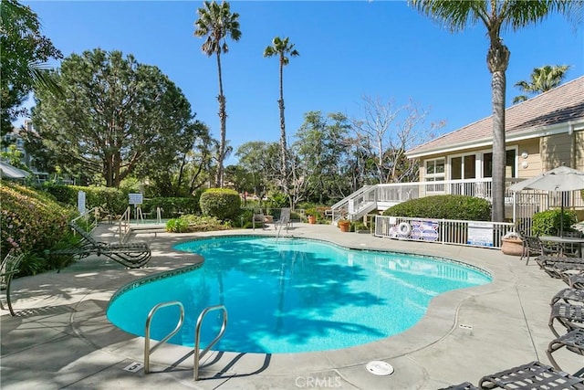 20191 Cape Coral Ln Unit 3-206, Huntington Beach, CA 92646 - community pool with a patio area