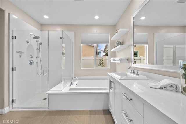 20552 Galloway, Saugus, CA 91350 - bathroom with a stall shower, vanity, a garden tub, and recessed lighting