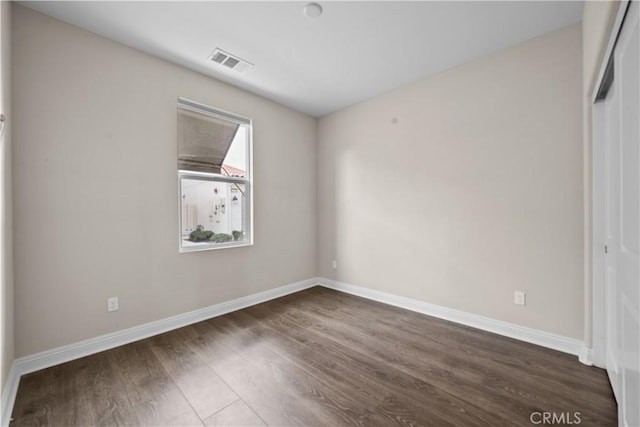 20552 Galloway, Saugus, CA 91350 - unfurnished bedroom with dark wood finished floors and baseboards