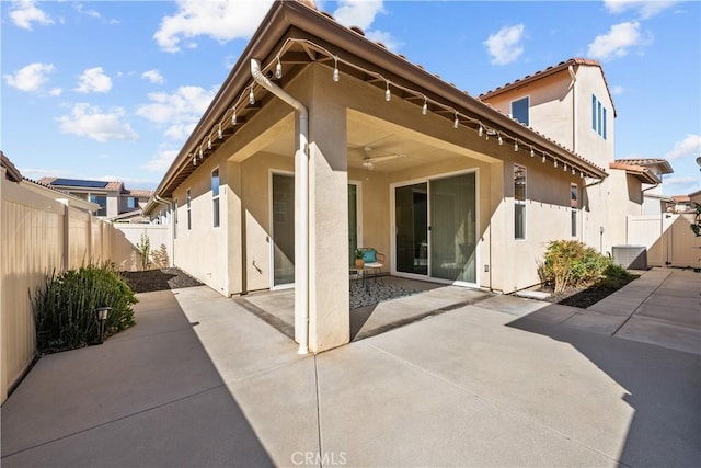 20552 Galloway, Saugus, CA 91350 - rear view of property featuring stucco siding, a fenced backyard, a patio, and a ceiling fan