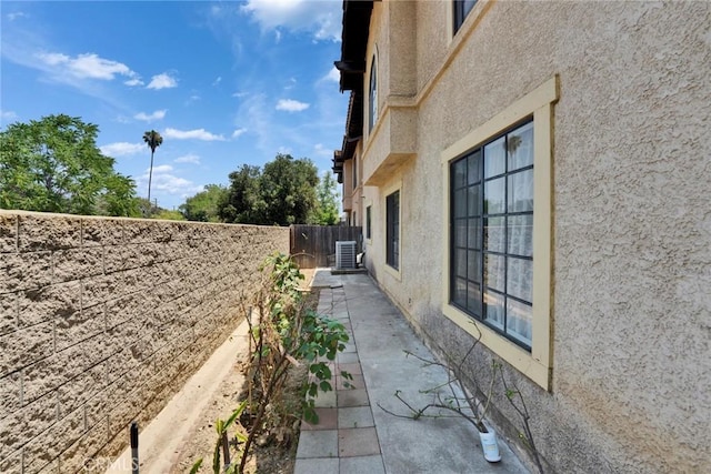 1029 S Reservoir St, Pomona, CA 91766 - view of side of property featuring stucco siding and a patio