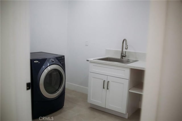 54889 Navajo Trl, Yucca Valley, CA 92284 - washroom with washer / dryer, cabinet space, and light tile patterned floors