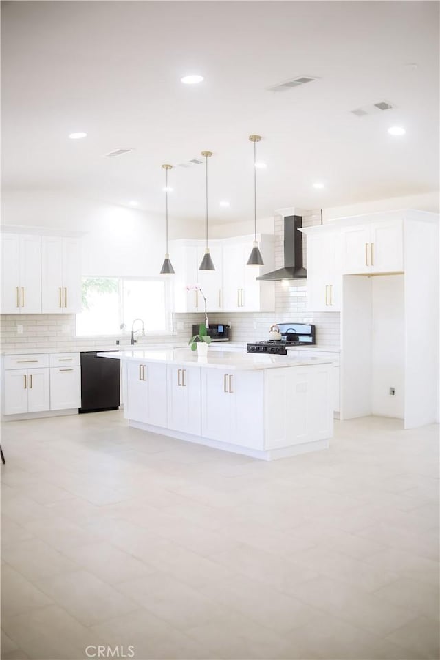 54889 Navajo Trl, Yucca Valley, CA 92284 - kitchen with wall chimney exhaust hood, black dishwasher, stove, decorative backsplash, and white cabinets