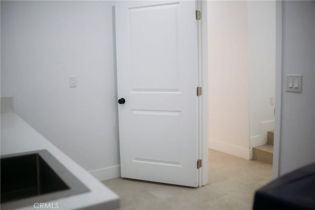 54889 Navajo Trl, Yucca Valley, CA 92284 - washroom with baseboards