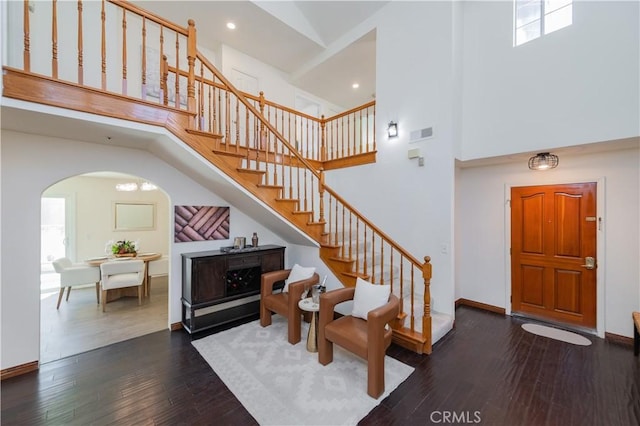 325 E Duarte Rd Unit C, Arcadia, CA 91006 - stairs featuring a towering ceiling, arched walkways, hardwood / wood-style floors, plenty of natural light, and recessed lighting