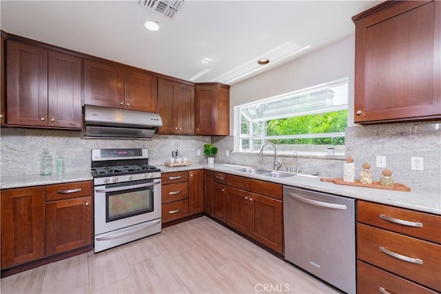 325 E Duarte Rd Unit C, Arcadia, CA 91006 - kitchen with stainless steel appliances, under cabinet range hood, backsplash, recessed lighting, and light stone counters
