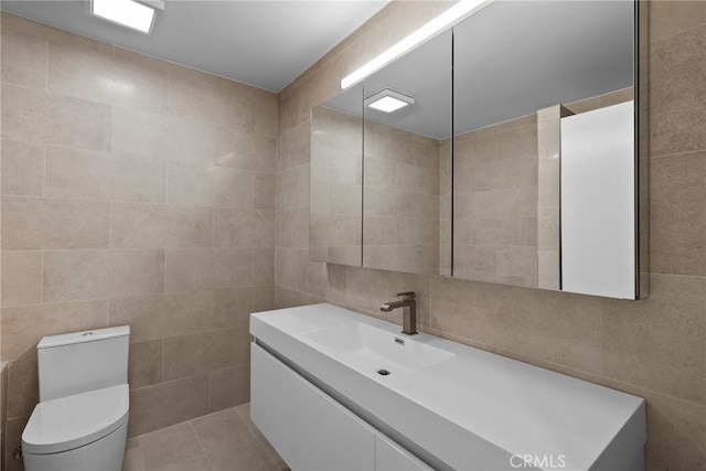 330 N Jackson St Unit 313, Glendale, CA 91206 - bathroom with tile walls and vanity