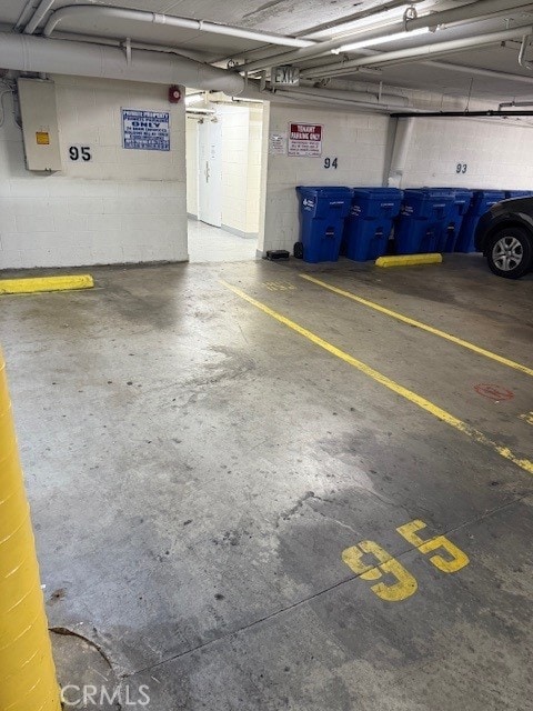 330 N Jackson St Unit 313, Glendale, CA 91206 - parking deck featuring electric panel and concrete block wall