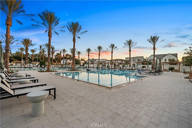 151 Fremont, Lake Forest, CA 92630 - pool at dusk featuring a community pool and a patio