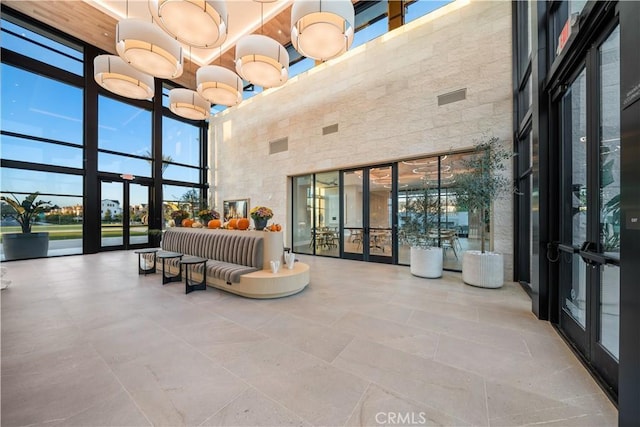151 Fremont, Lake Forest, CA 92630 - community lobby with a towering ceiling and floor to ceiling windows