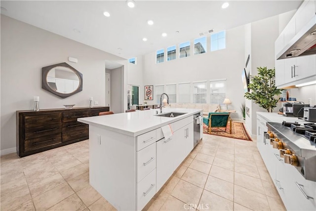 151 Fremont, Lake Forest, CA 92630 - kitchen featuring stainless steel appliances, an island with sink, under cabinet range hood, white cabinetry, and recessed lighting