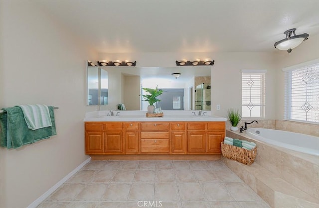 2142 Root St, Fullerton, CA 92833 - bathroom featuring a bath, a stall shower, double vanity, and tile patterned floors