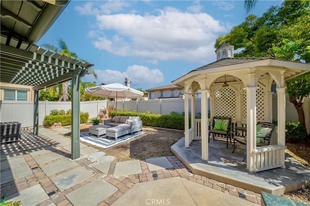 2142 Root St, Fullerton, CA 92833 - fenced backyard featuring a patio area, an outdoor hangout area, and a gazebo