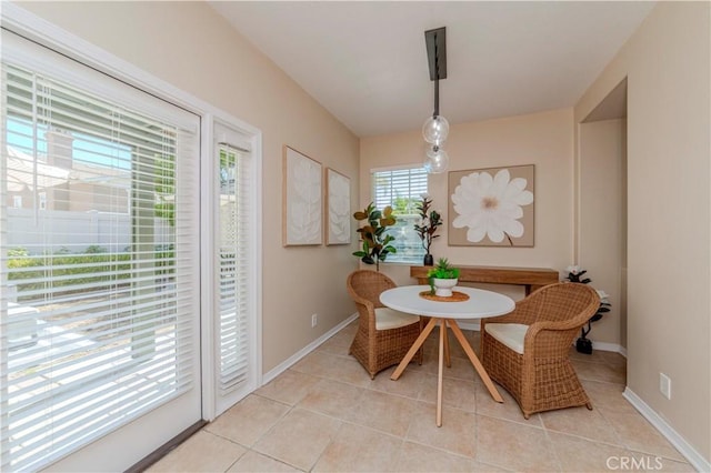 2142 Root St, Fullerton, CA 92833 - dining area with light tile patterned flooring and baseboards
