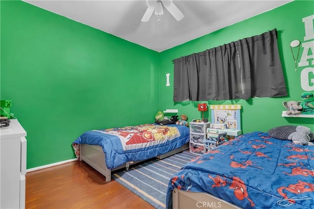 7708 Birchleaf Ave, Pico Rivera, CA 90660 - bedroom with wood finished floors and a ceiling fan