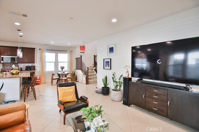 233 47th St, Long Beach, CA 90805 - living room with stairs, light tile patterned flooring, and recessed lighting