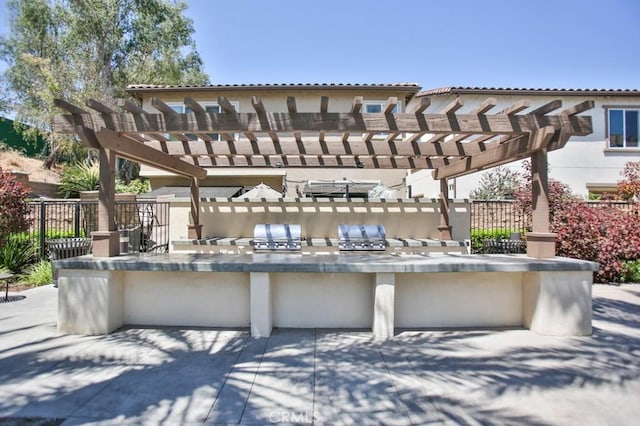 233 47th St, Long Beach, CA 90805 - view of patio with area for grilling and a pergola